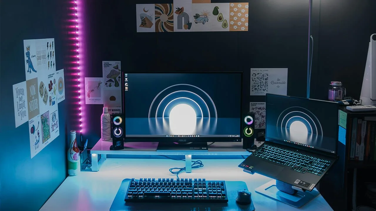 Modern web design and development workspace with desktop and laptop setup for website development and digital solutions